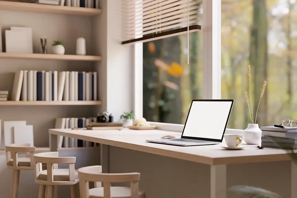 minimal-comfortable-workspace-with-laptop-on-wood A 30-60-90 Launch Plan for Your Home Office for Remote Employees