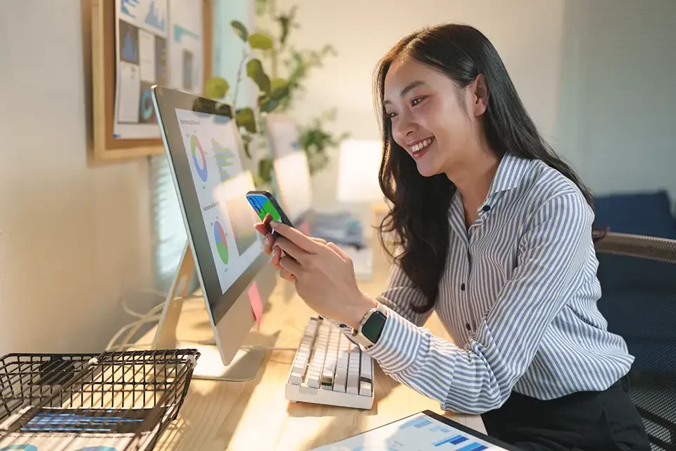 smiling-asian-businesswoman-comparing-data How Multi-Factor Authentication Works in Real Life