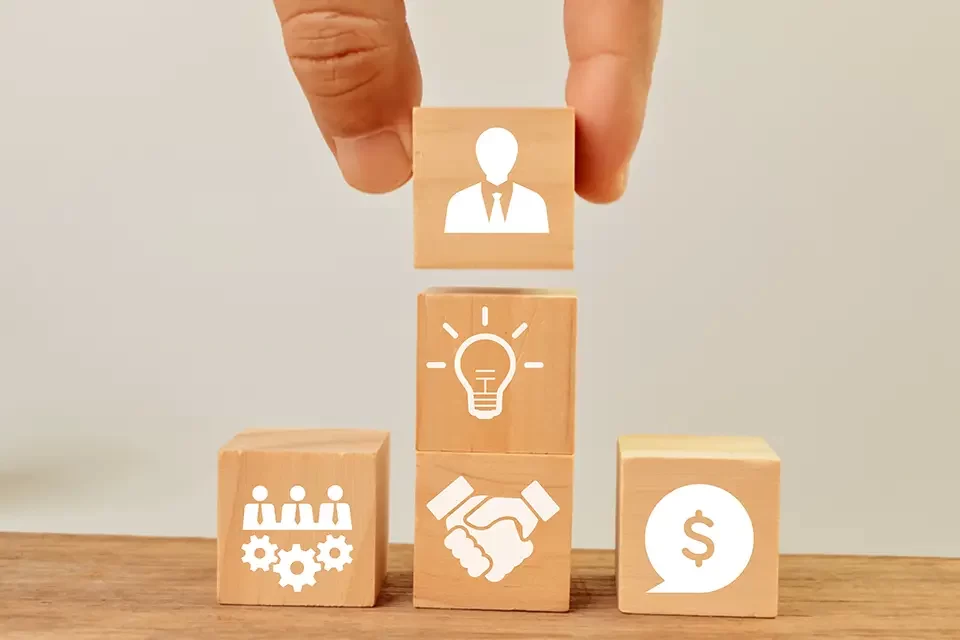 wooden cubes with teamwork Kinds of Managed Service Provider